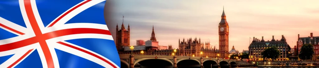 night view of city in uk with flag